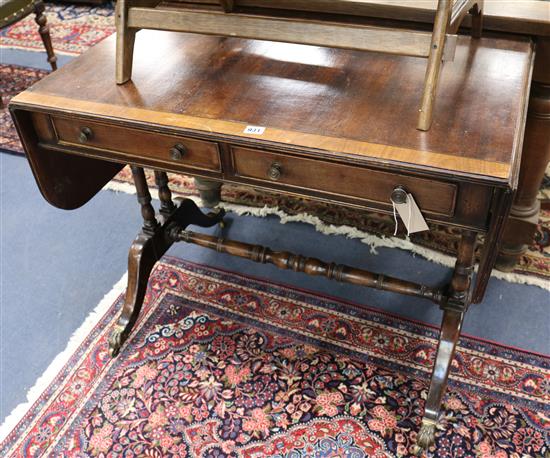 A Regency cross banded mahogany sofa table W.93cm